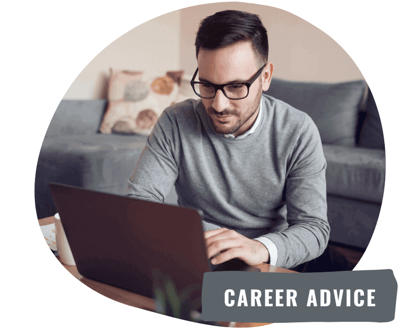 man in glasses working on laptop and searching jobs